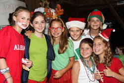 Campers celebrating Christmas in July at Christian summer camp for girls