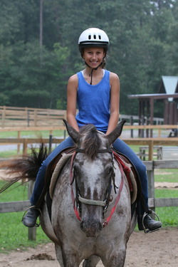 Camper riding in Camp Skyline's English Ring